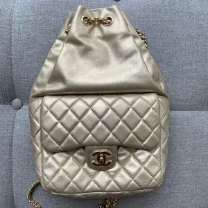 Gold chanel drawstring backpack
